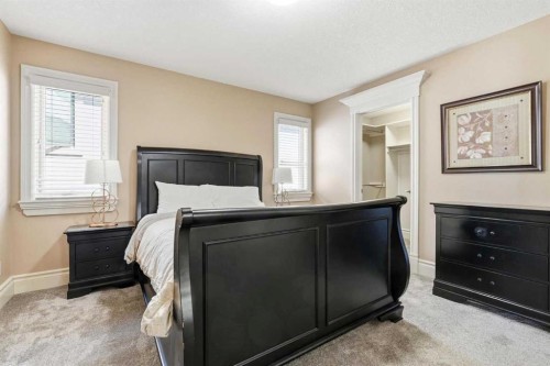109 Aspen Ridge Place Sw, Calgary, AB - Indoor Photo Showing Bedroom