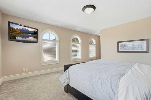 109 Aspen Ridge Place Sw, Calgary, AB - Indoor Photo Showing Bedroom
