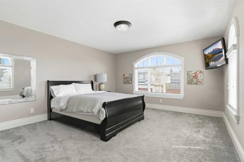 109 Aspen Ridge Place Sw, Calgary, AB - Indoor Photo Showing Bedroom