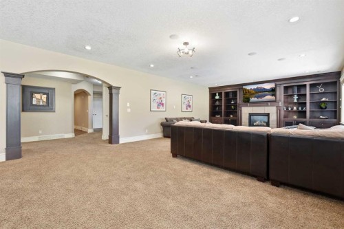 109 Aspen Ridge Place Sw, Calgary, AB - Indoor With Fireplace