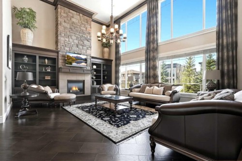 109 Aspen Ridge Place Sw, Calgary, AB - Indoor Photo Showing Living Room With Fireplace