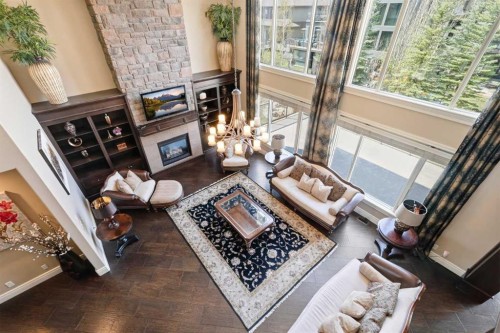 109 Aspen Ridge Place Sw, Calgary, AB - Indoor With Fireplace