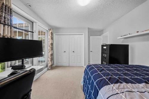 501 Patterson View Sw, Calgary, AB - Indoor Photo Showing Bedroom