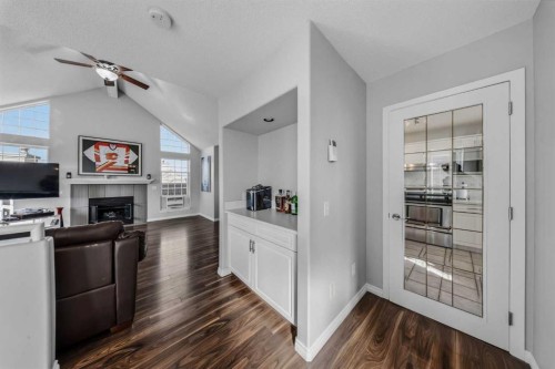 501 Patterson View Sw, Calgary, AB - Indoor With Fireplace