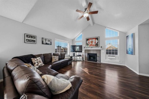 501 Patterson View Sw, Calgary, AB - Indoor Photo Showing Living Room With Fireplace