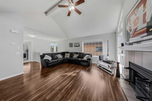 501 Patterson View Sw, Calgary, AB - Indoor Photo Showing Living Room With Fireplace