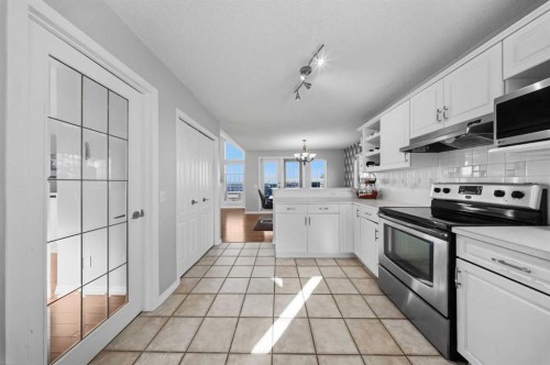 501 Patterson View Sw, Calgary, AB - Indoor Photo Showing Kitchen With Stainless Steel Kitchen
