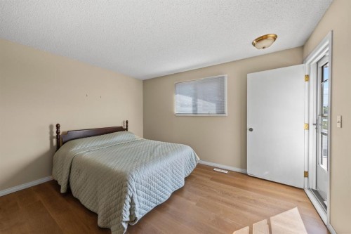 203 Silver Valley Boulevard Nw, Calgary, AB - Indoor Photo Showing Bedroom