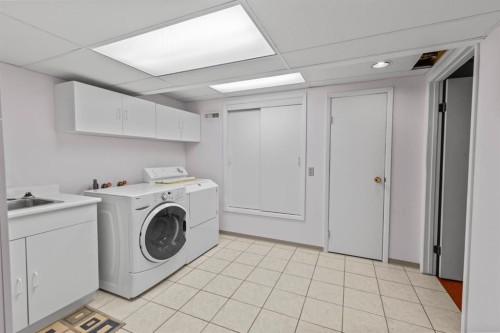 203 Silver Valley Boulevard Nw, Calgary, AB - Indoor Photo Showing Laundry Room