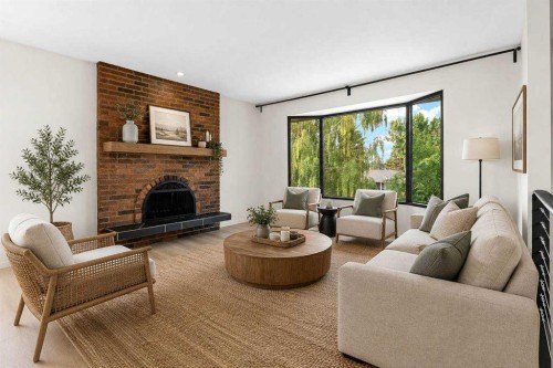 5467 Dalrymple Crescent Nw, Calgary, AB - Indoor Photo Showing Living Room With Fireplace
