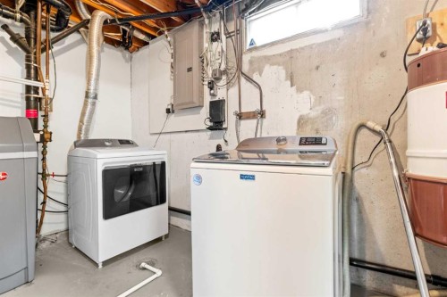 5467 Dalrymple Crescent Nw, Calgary, AB - Indoor Photo Showing Laundry Room