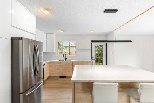 5467 Dalrymple Crescent Nw, Calgary, AB - Indoor Photo Showing Kitchen With Double Sink