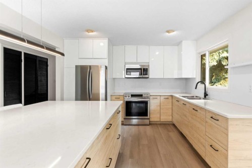 5467 Dalrymple Crescent Nw, Calgary, AB - Indoor Photo Showing Kitchen With Double Sink With Upgraded Kitchen