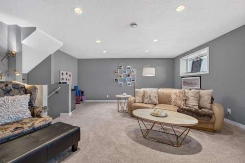 79 Cranberry Square Se, Calgary, AB - Indoor Photo Showing Living Room