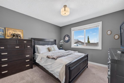 79 Cranberry Square Se, Calgary, AB - Indoor Photo Showing Bedroom