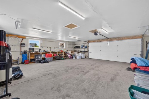 79 Cranberry Square Se, Calgary, AB - Indoor Photo Showing Garage