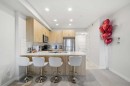 318-55 Wolf Hollow Crescent Se, Calgary, AB  - Indoor Photo Showing Kitchen With Double Sink 