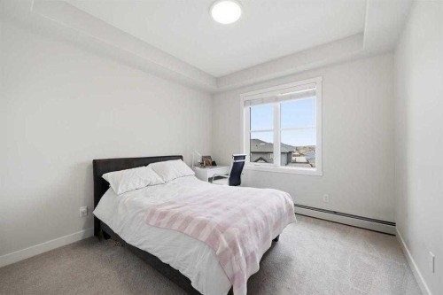 318-55 Wolf Hollow Crescent Se, Calgary, AB - Indoor Photo Showing Bedroom