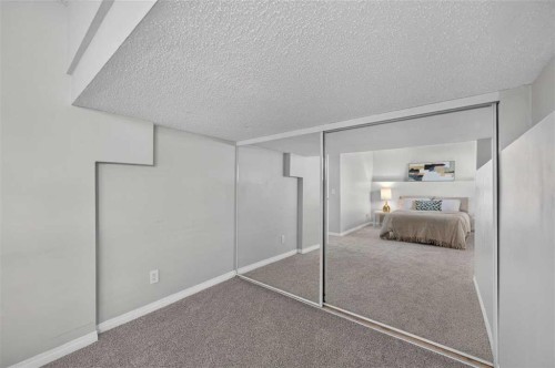 307 Covehaven View Ne, Calgary, AB - Indoor Photo Showing Bedroom