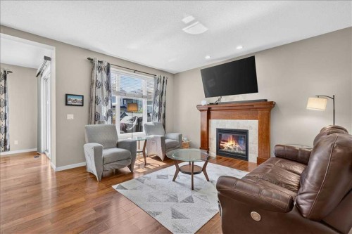 1017 Brightoncrest Common Se, Calgary, AB - Indoor Photo Showing Living Room With Fireplace