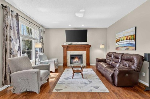 1017 Brightoncrest Common Se, Calgary, AB - Indoor Photo Showing Living Room With Fireplace