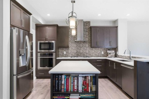 81 Riviera View, Cochrane, AB - Indoor Photo Showing Kitchen With Stainless Steel Kitchen With Upgraded Kitchen