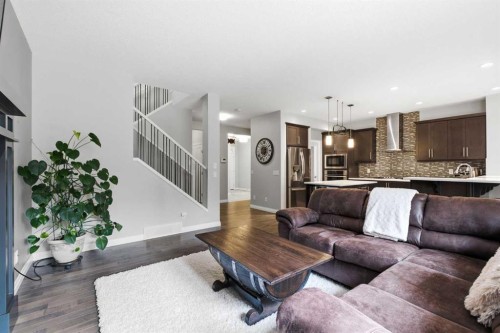 81 Riviera View, Cochrane, AB - Indoor Photo Showing Living Room