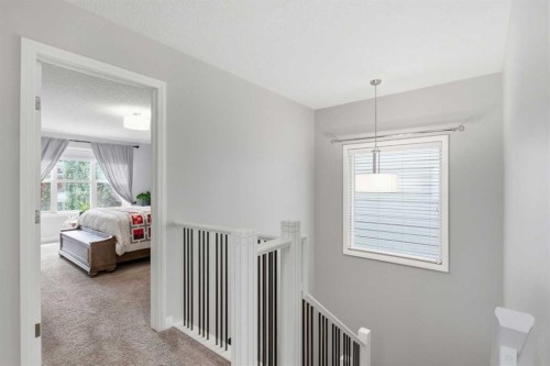 81 Riviera View, Cochrane, AB - Indoor Photo Showing Other Room