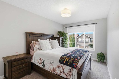 81 Riviera View, Cochrane, AB - Indoor Photo Showing Bedroom