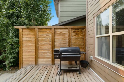 81 Riviera View, Cochrane, AB - Outdoor With Deck Patio Veranda With Exterior