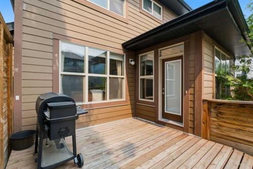 81 Riviera View, Cochrane, AB - Outdoor With Deck Patio Veranda With Exterior