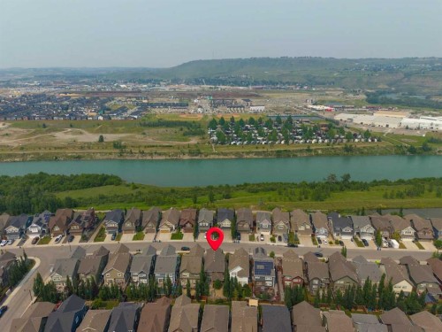 81 Riviera View, Cochrane, AB - Outdoor With Body Of Water With View