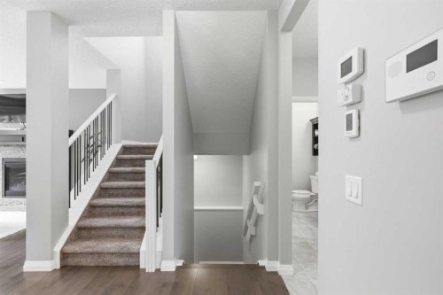 81 Riviera View, Cochrane, AB - Indoor Photo Showing Other Room