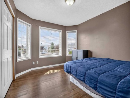 285 Fresno Place Ne, Calgary, AB - Indoor Photo Showing Bedroom