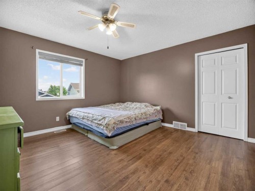 285 Fresno Place Ne, Calgary, AB - Indoor Photo Showing Bedroom