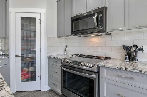 267 Cimarron Vista Court, Okotoks, AB - Indoor Photo Showing Kitchen With Upgraded Kitchen