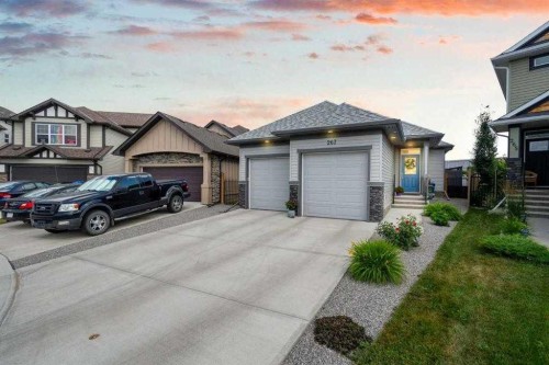 267 Cimarron Vista Court, Okotoks, AB - Outdoor With Facade