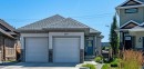 267 Cimarron Vista Court, Okotoks, AB  - Outdoor With Facade 