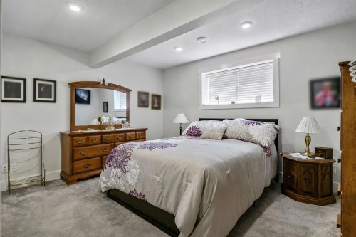 267 Cimarron Vista Court, Okotoks, AB - Indoor Photo Showing Bedroom