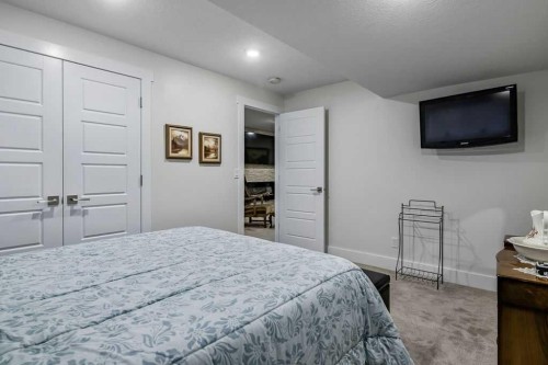 267 Cimarron Vista Court, Okotoks, AB - Indoor Photo Showing Bedroom