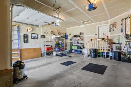 267 Cimarron Vista Court, Okotoks, AB - Indoor Photo Showing Garage