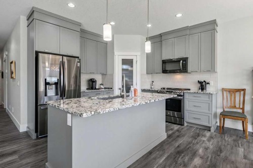 267 Cimarron Vista Court, Okotoks, AB - Indoor Photo Showing Kitchen With Upgraded Kitchen