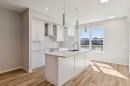 471 Hotchkiss Manor Se, Calgary, AB  - Indoor Photo Showing Kitchen With Upgraded Kitchen 
