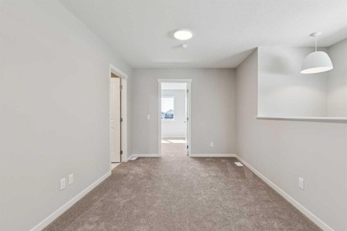 471 Hotchkiss Manor Se, Calgary, AB - Indoor Photo Showing Other Room