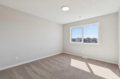 471 Hotchkiss Manor Se, Calgary, AB - Indoor Photo Showing Other Room