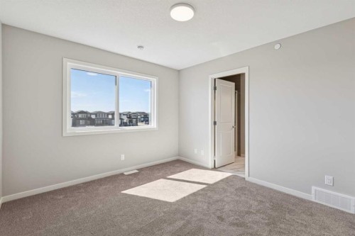 471 Hotchkiss Manor Se, Calgary, AB - Indoor Photo Showing Other Room