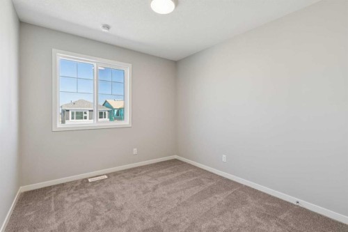 471 Hotchkiss Manor Se, Calgary, AB - Indoor Photo Showing Other Room