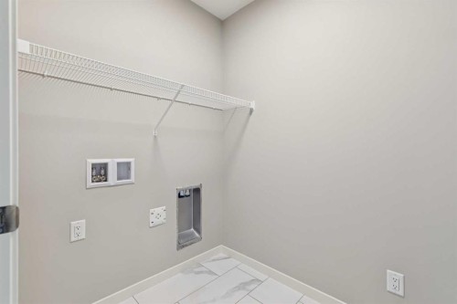 471 Hotchkiss Manor Se, Calgary, AB - Indoor With Storage
