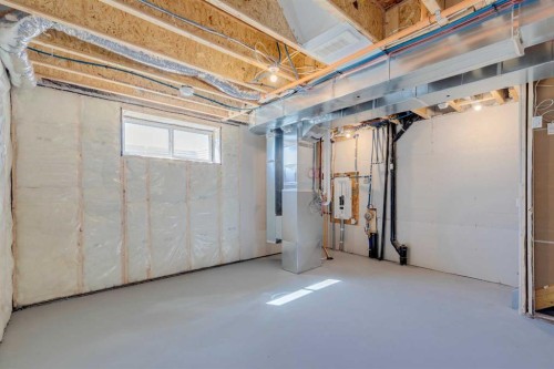 471 Hotchkiss Manor Se, Calgary, AB - Indoor Photo Showing Basement