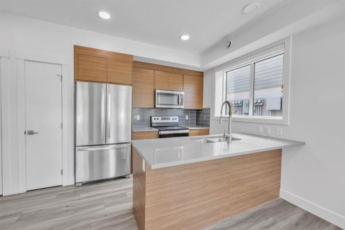 19625 45 Street Se, Calgary, AB - Indoor Photo Showing Kitchen With Stainless Steel Kitchen